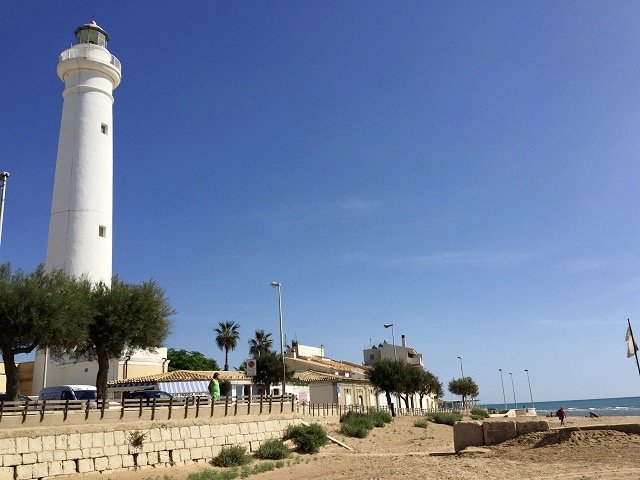 Lighthouse in Punta Secca on the southern coast of Sicily